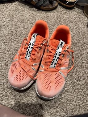 On Running Women’s Coral-Orange Cloud Running Shoes